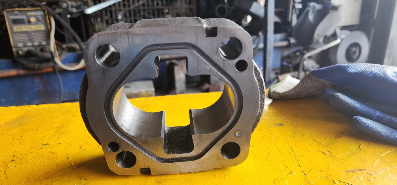 Phục hồi vỏ bơm bánh răng – Gear pump block by Laser cladding